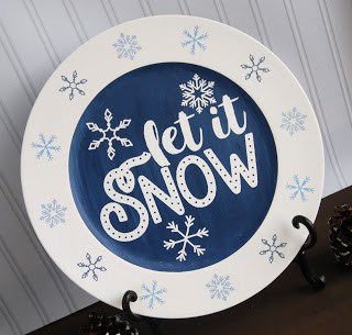 Make this cute painted charger with our free Let It Snow SVG file. These free svg files work with Silhouette and Cricut cutters