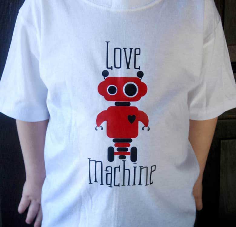 Make a super cute Valentine t-shirt for your little guy with this free Love Machine SVG file. This free Valentine SVG file will work with Silhouette, Cricut, and other electronic cutters.