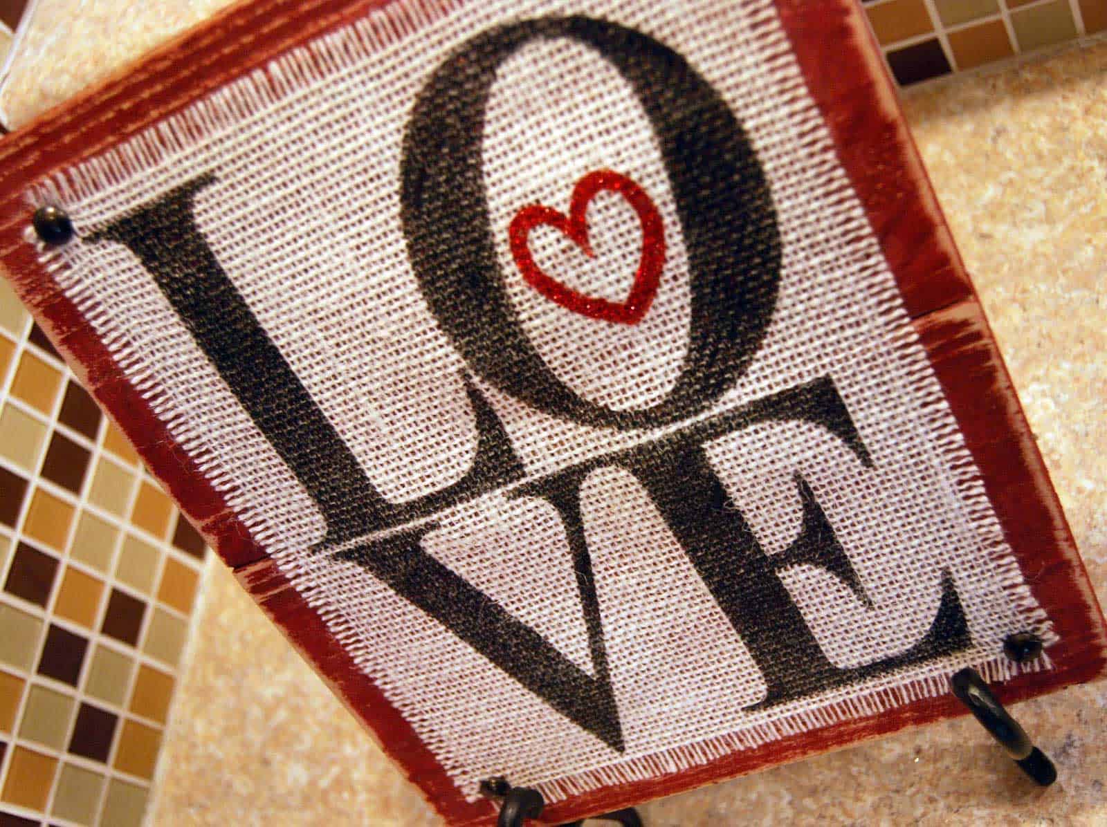 Make this Burlap and Wood Love Sign with your Silhouette or Cricut. Plus, get the SVG cut file for free!