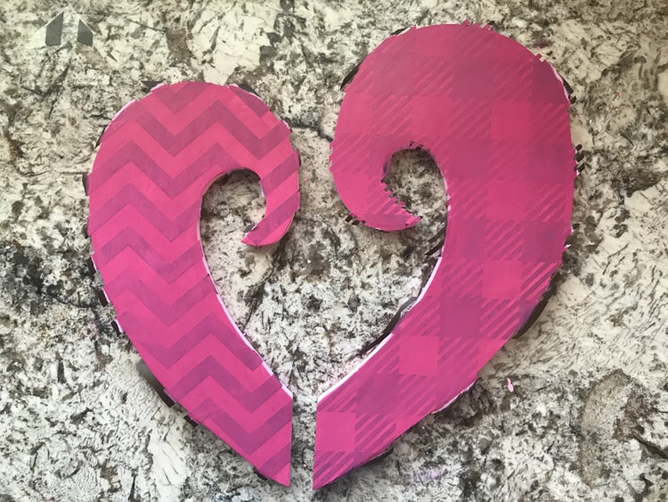 Make your own valentine door hanger with this free funky heart svg file. It works with Cricut, Silhouette, and other digital cutters