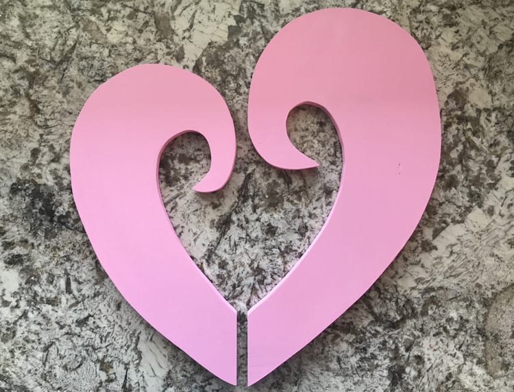 Make your own valentine door hanger with this free funky heart svg file. It works with Cricut, Silhouette, and other digital cutters