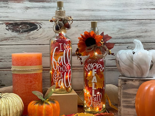 DIY Lighted Glass Bottles for Fall - Burton Avenue