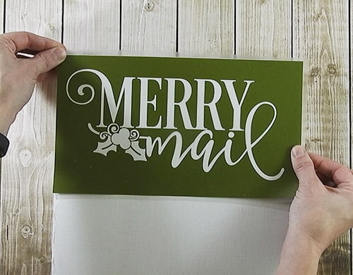 Create a place to display your Christmas Cards with this easy to follow tutorial. With a few supplies and you Silhouette or Cricut machine, you be able to create this cut Christmas Card holder for your home. This DIY project is easy and quick to make and is the perfect decoration for home. #ChristmasSilhouette #ChristmasCricut #ChristmasSVG #ChristmasCardholder