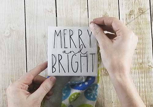 Make these adorable mini signs for Christmas sign with this easy to follow tutorial. With a few supplies and your Silhouette or Cricut machine, you'll be able to create these frame canvas Christmas signs for your home. This DIY project is easy and quick to make and is the perfect decoration for home. #ChristmasSilhouette #ChristmasCricut #ChristmasSVG