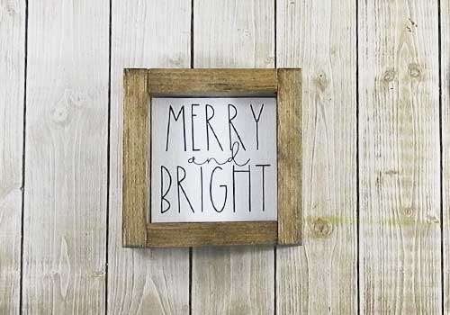 Make these adorable mini signs for Christmas sign with this easy to follow tutorial. With a few supplies and your Silhouette or Cricut machine, you'll be able to create these frame canvas Christmas signs for your home. This DIY project is easy and quick to make and is the perfect decoration for home. #ChristmasSilhouette #ChristmasCricut #ChristmasSVG