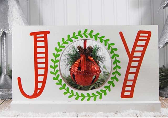 Make this cute DIY Christmas Joy Sign for you home or as a gift. #christmassvg #silhouette #cricut 