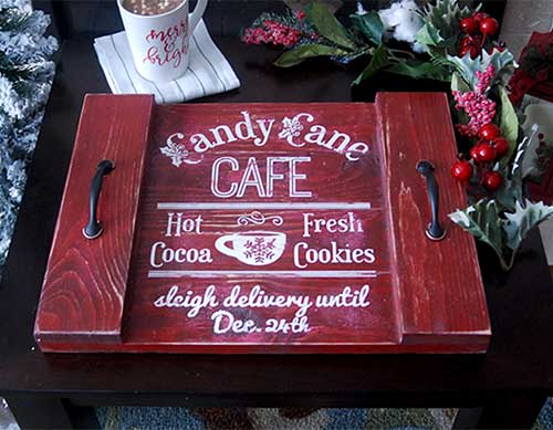 Make this cute DIY Wood Tray for Christmas sign with this easy to follow tutorial. With a few tools and your Silhouette or Cricut machine, you'll be able to create this DIY Wood Christmas Tray for your home. This DIY project is easy and quick to make and is the perfect decoration for home. #ChristmasSilhouette #ChristmasCricut #ChristmasSVG