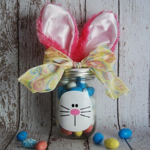 Make your own Easter Bunny Mason Jar with your Silhouette, Cricut, or Brother Cutting Machine. This Easter project is quick and easy and makes a great gift for Easter. #eastersilhouetteprojects #easterprojects #easterbrotherprojects