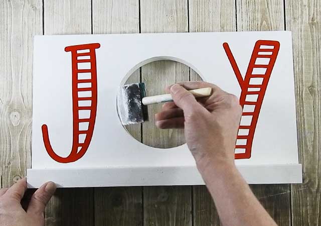 Make this cute DIY Christmas Joy Sign for you home or as a gift. #christmassvg #silhouette #cricut 