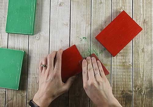 Make this darling Christmas sign with this easy to follow tutorial. With a few supplies and your Silhouette or Cricut machine, you'll be able to create this hinged Christmas block sign for your home home. This DIY project is easy and quick to make and is the perfect decoration for home. #ChristmasSilhouette #ChristmasCricut #ChristmasSVG